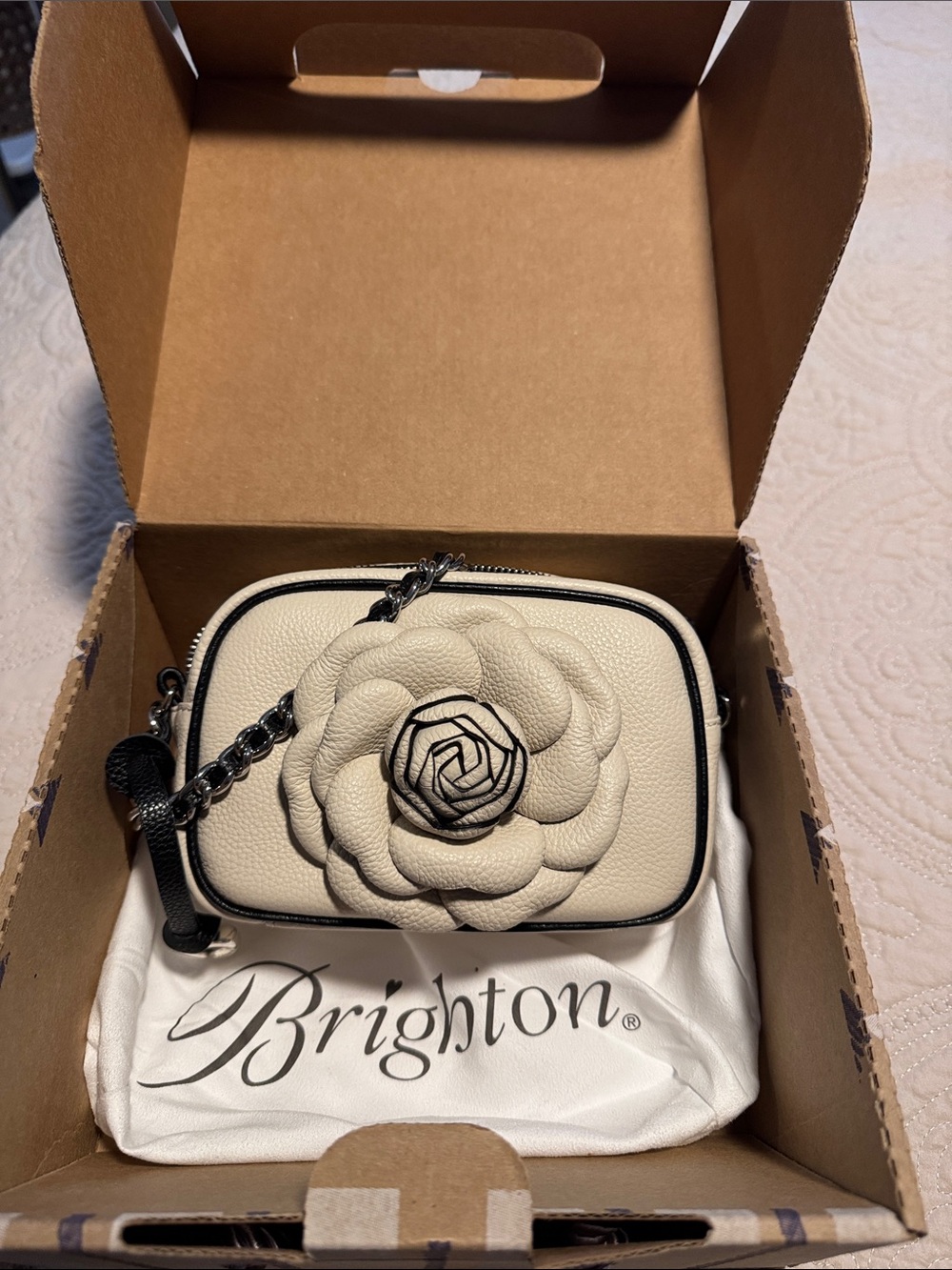 Brighton Cream Camellia Pebbled Leather Crossbody with Black Trim